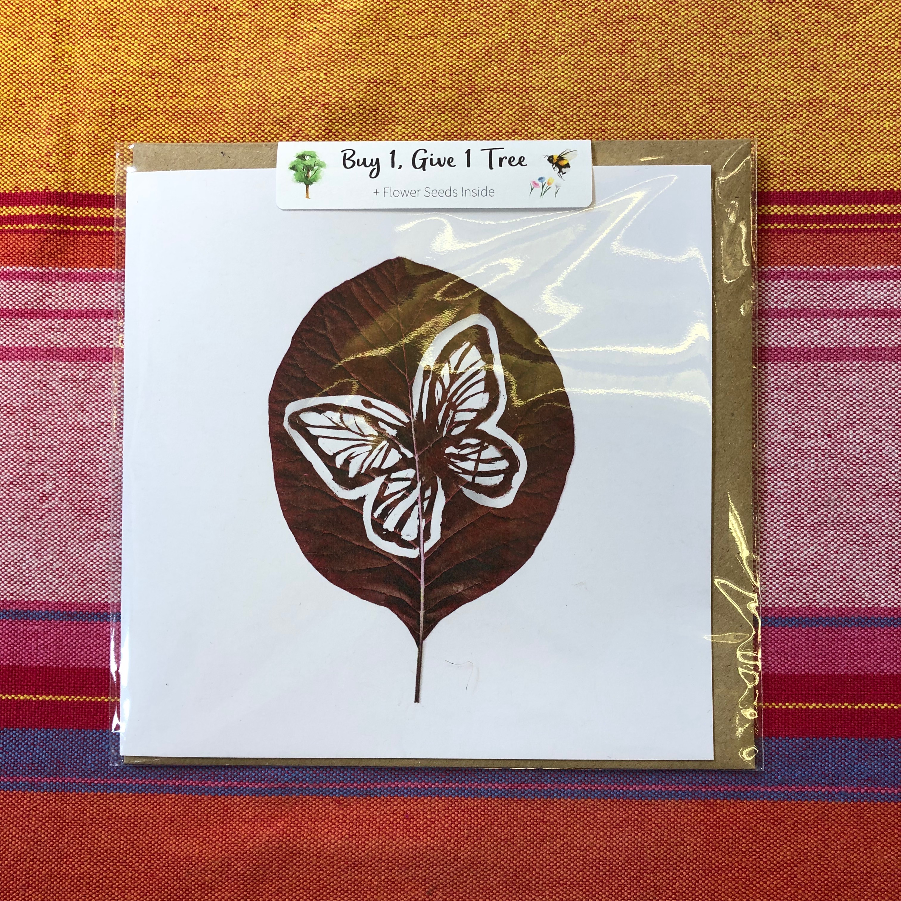 card with leaf and butterfly design